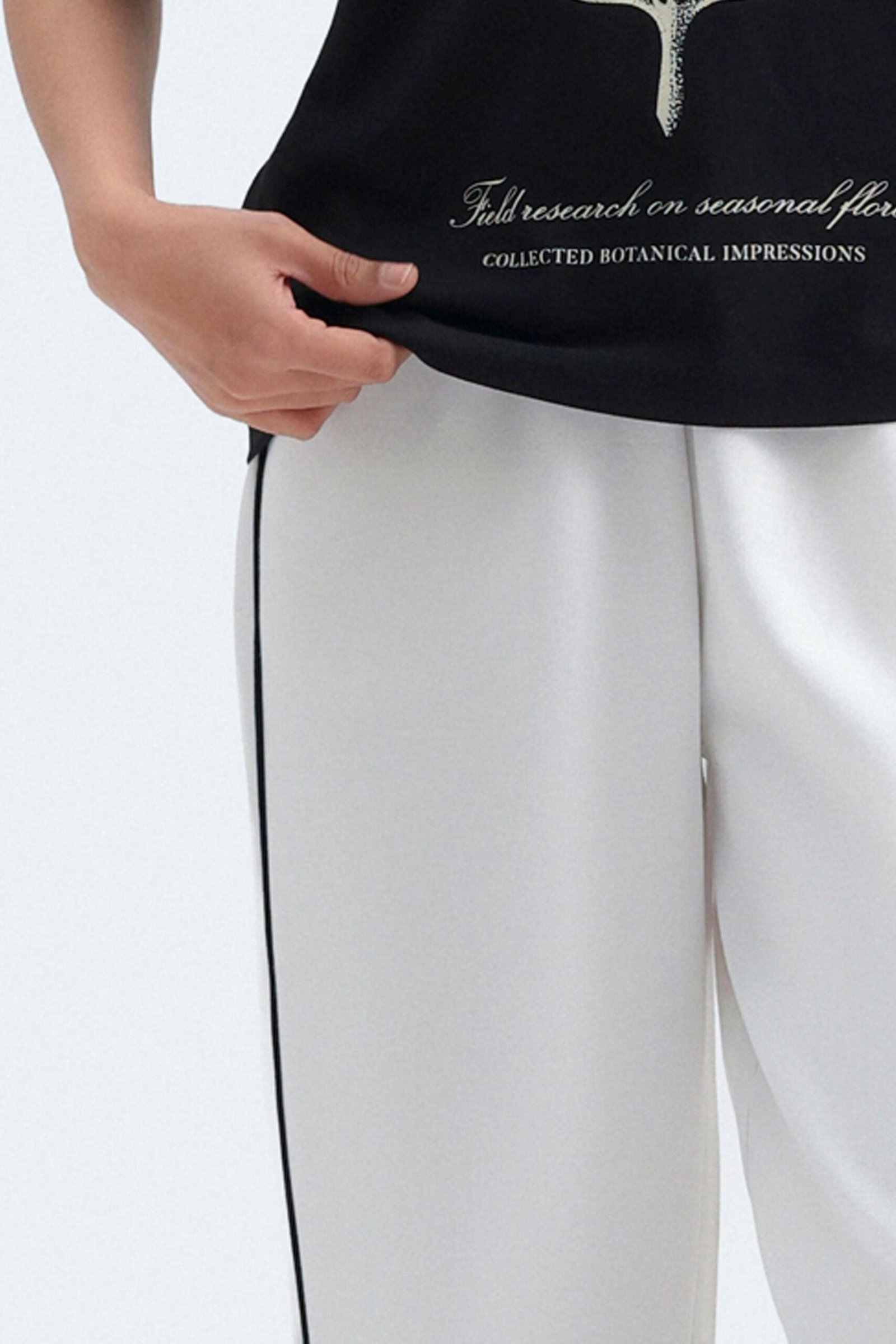 Loose Trousers With Side Pipping Detail - Image 2