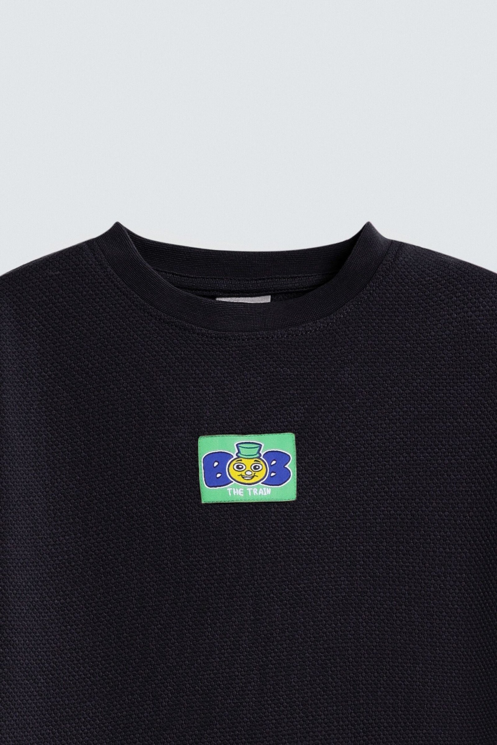 Textured T-Shirt With Label Patch - Image 5